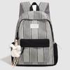 Schulrucksack1011 Frühling neu Japanisches Mädchen Herz karierter Rucksack leicht große Kapazität Schüler-Schulrucksack niedlicher Rucksack