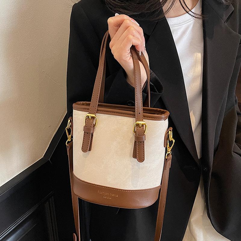 Geantă tip găleată cu design de nișă populară anul acesta, Stil nou de primăvară pentru femei, Geantă simplă pe un umăr și crossbody, Geantă de mână mică la modă