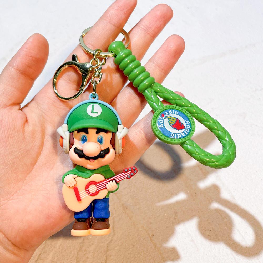 27 Stile Super Mario Bros Schlüsselanhänger Actionfigur Niedlicher Cartoon-Charakter Spielzeugpuppe Modell Dekoration Kindergeburtstagsgeschenk