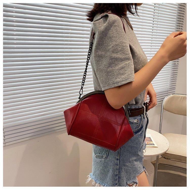 Spring and summer new solid color simple shell bag large capacity portable change bag fashion chain oblique span shoulder mobile phone bag