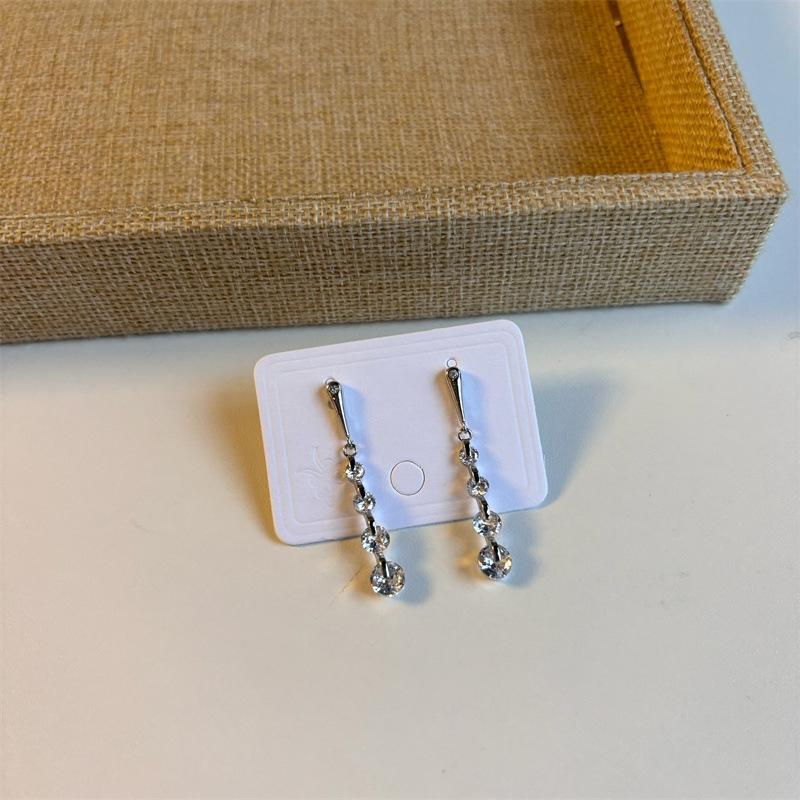 

Серьги-капли из циркона с бахромой, простые, с темпераментом, высококлассные серьги-пусеты, нишевые, универсальные, модные серьги для женщин