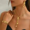 Set di gioielli stile europeo e americano, collana lunga placcata oro 18 carati, orecchini geometrici con nappe, braccialetto versatile e di nicchia per donna