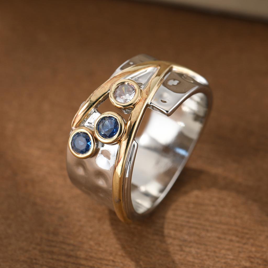 Luxurious hammered pattern inlaid with artificial gemstones ring, made of copper, for women's jewelry, suitable for party wear.