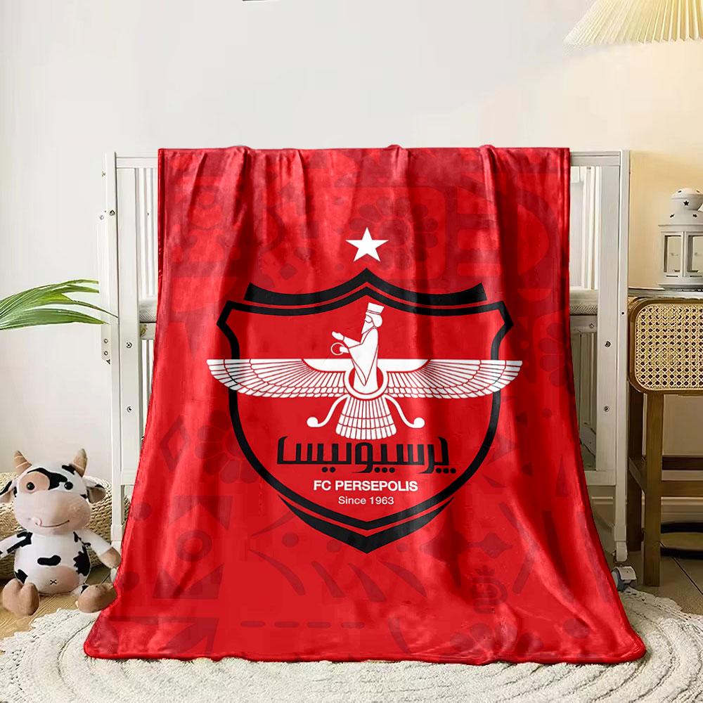 A red background with a central crest, winged figure, and a top white star. for all seasons blanket lunch break throw gift