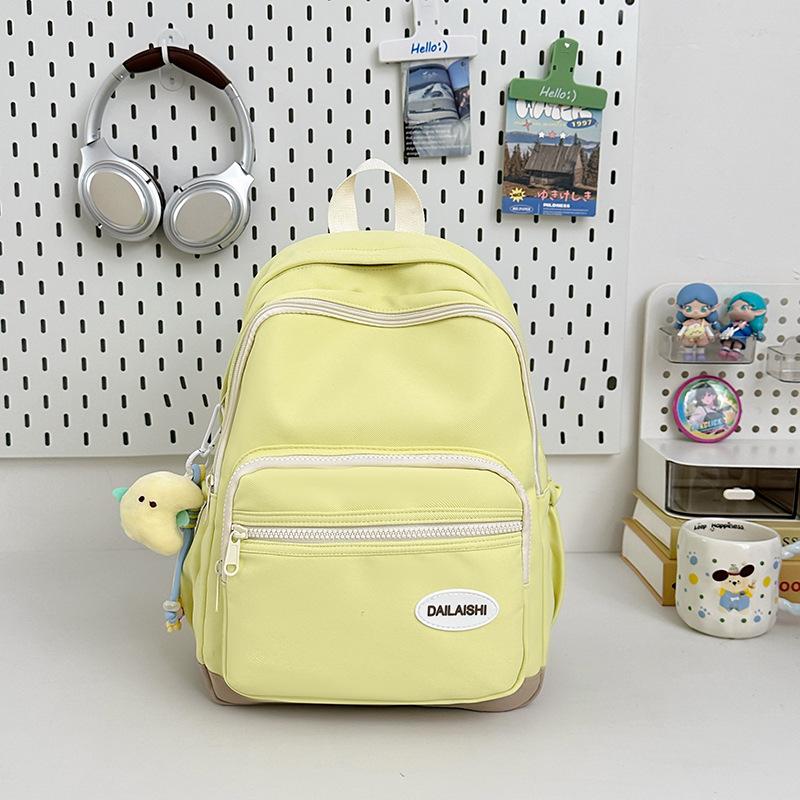 High-value Candy Color, Fresh and Sweet Backpack, Lightweight Make-up Class for Junior High School Students, and Large-capacity Backpack.