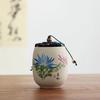 Portable Sealed Ceramic Tea Jar – Pottery Storage Canister with Plum, Orchid, Bamboo & Chrysanthemum Design