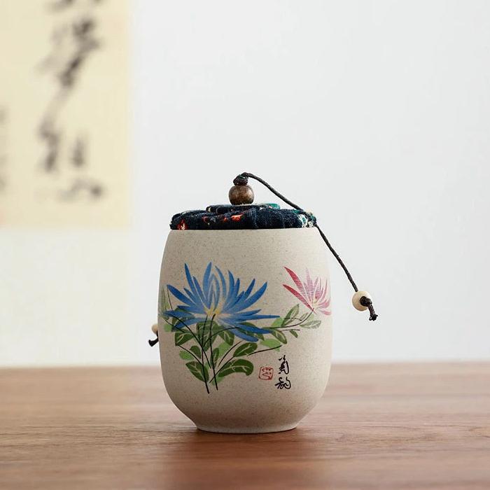 Portable Sealed Ceramic Tea Jar – Pottery Storage Canister with Plum, Orchid, Bamboo & Chrysanthemum Design