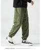 Men's American-Style Autumn Overalls: Fashionable, Casual, Versatile Nine-Point Pants with Loose Cuffs and Multi-Pocket Design.