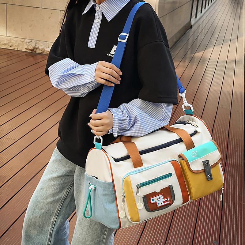 Large capacity short trip bag travel bag handbag women's storage bag light going out duffel bag delivery bag