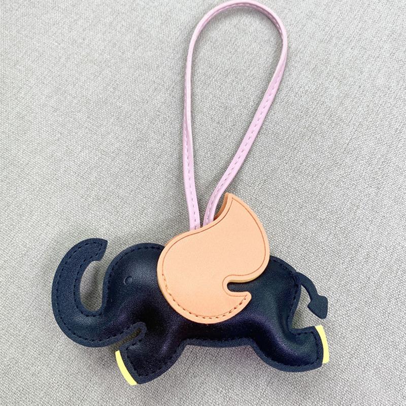 Trendy Designer PU Lær Vinger Flygende Elefant Henger Nøkkelring Anheng Dekorasjon For Damer Veske Sjarm Tilbehør Ornament Gaver