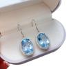 Kolczyki z naturalnym błękitnym topazem: Elegancka biżuteria z kamieniami szlachetnymi ze srebra próby 925