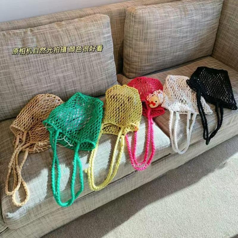 Sac de plage tissé creux design de niche d'été pour femmes nouveau sac à bandoulière en maille grande capacité