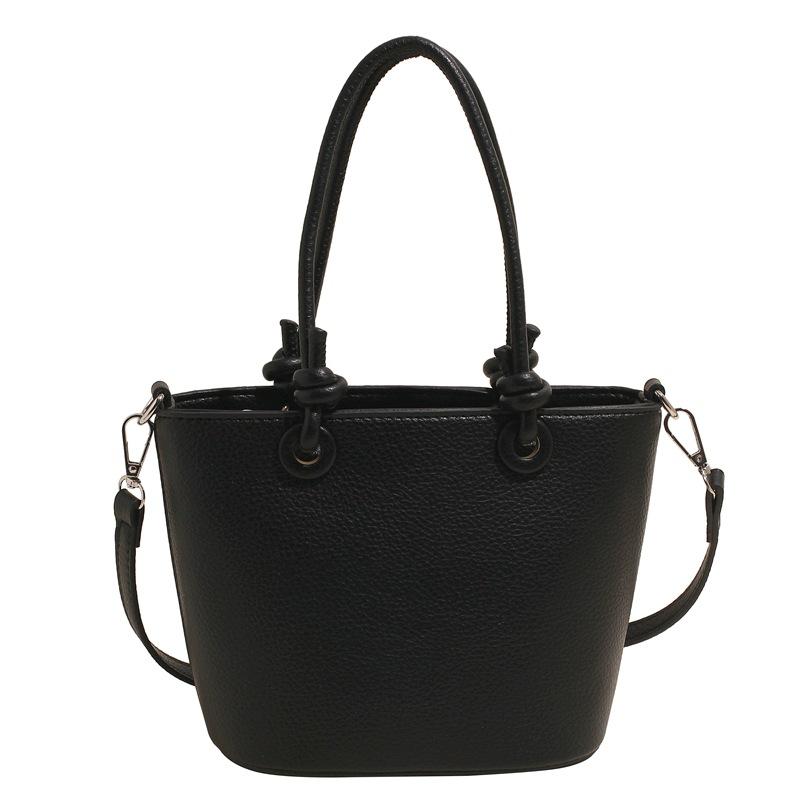 Wholesale hot sale high quality casual lychee pattern solid color portable bucket bag versatile simple wind commuter messenger bag women