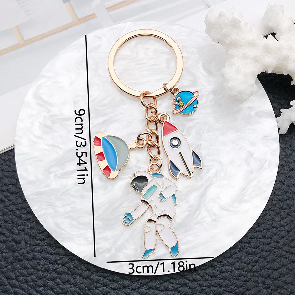 Cross-Border Drip Oil Astronaut UFO Rocket Keychain - Creative Cartoon Backpack Pendant