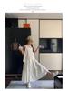 Trendy White Hollow Camisole Dress Set: Flattering Two-Piece Layered Vest & Dress