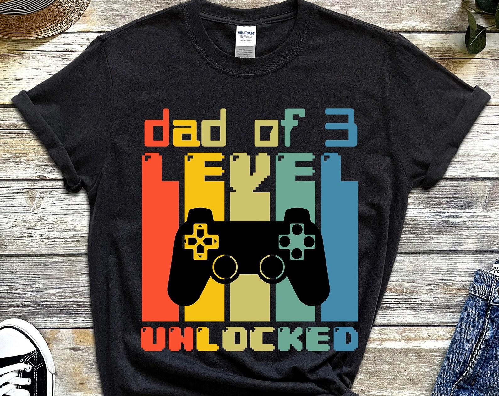 Dad of 3 T-shirt, Dad of Three Level Unlocked Shirt, Pregnancy Announcement, Father Gamer Gift, Fathers Day Gifts, Leveled up to dad of 3 3XL