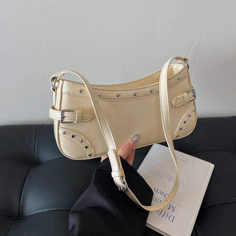 

Премиальная сумка женская новая весна и лето популярная модная универсальная нишевая сумка через плечо сумка-багет для通勤 бежевый