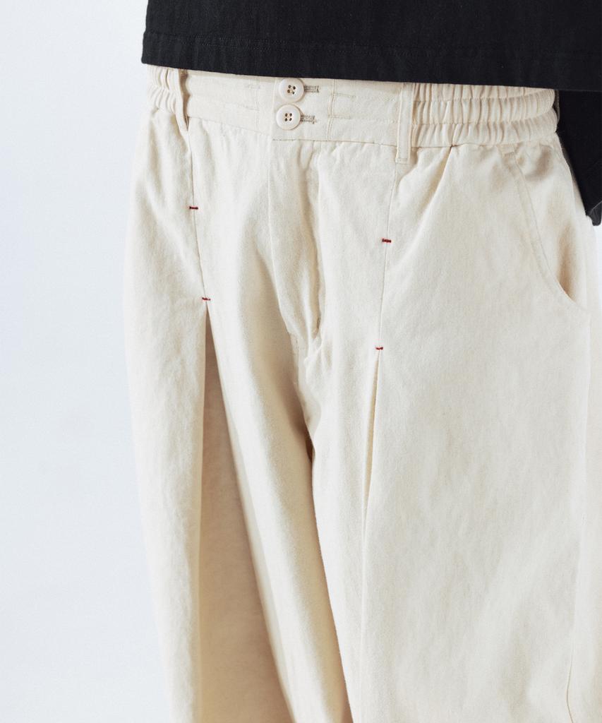 ANGLAN Unbalance Long Tuck Balloon Pants - Ivory