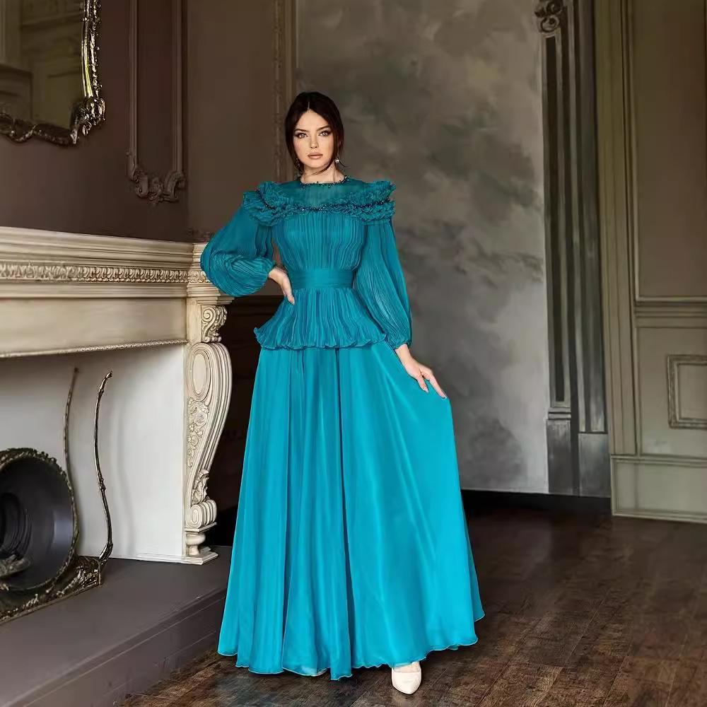 

Летний женский комплект из топа с сетчатыми вставками прилегающего силуэта и юбки миди Small