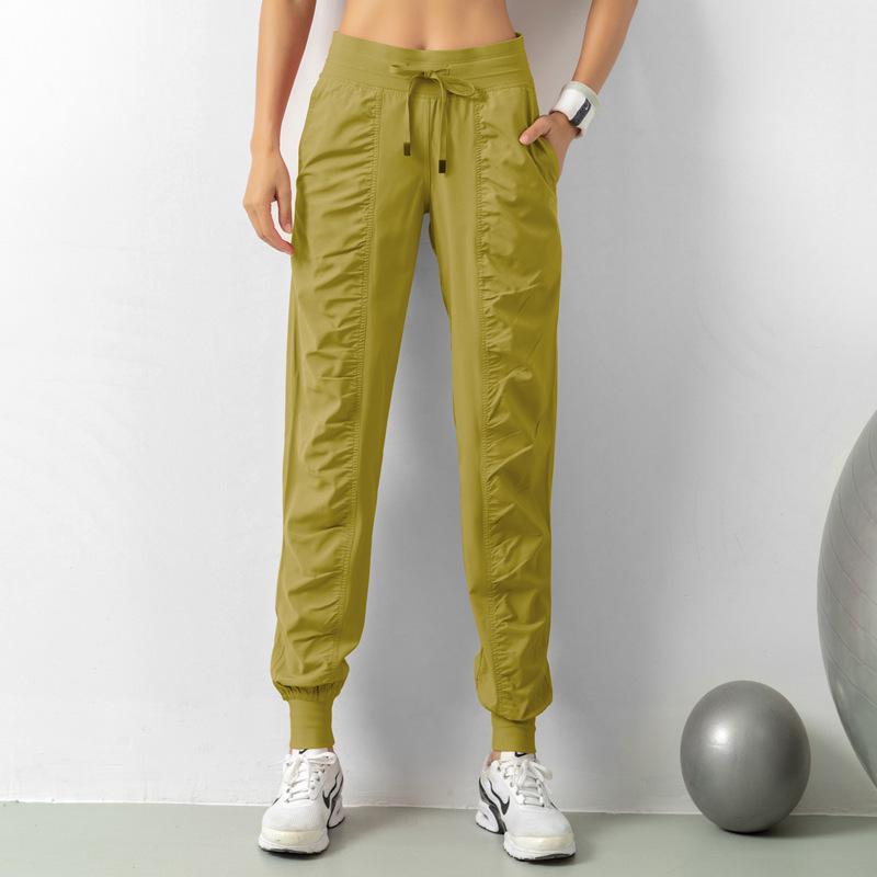 Women's Quick-Dry Yoga Fitness Nine-Point Cuffed Pants with Pockets