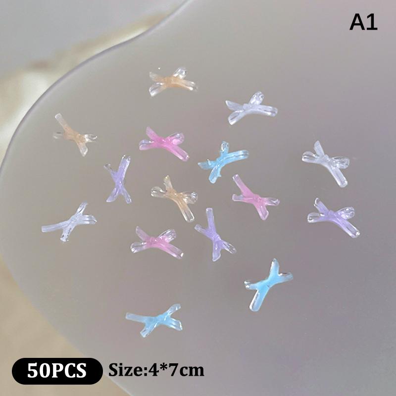 50Pcs Ice Transparent Color Bowknots Resin Nail Art Decorations 3D Mini Cute Bows Nail Charms For Diy Nails Accessories
