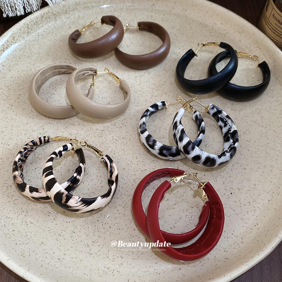 Silver needle leather geometric round pendant earrings European and American temperament earrings niche design earrings women