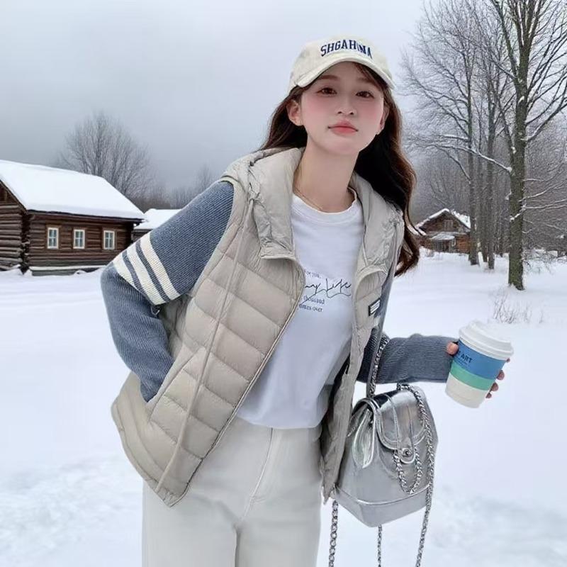 Light luxury small down jacket winter new design sense fashion splicing knitted light and thin short hooded jacket