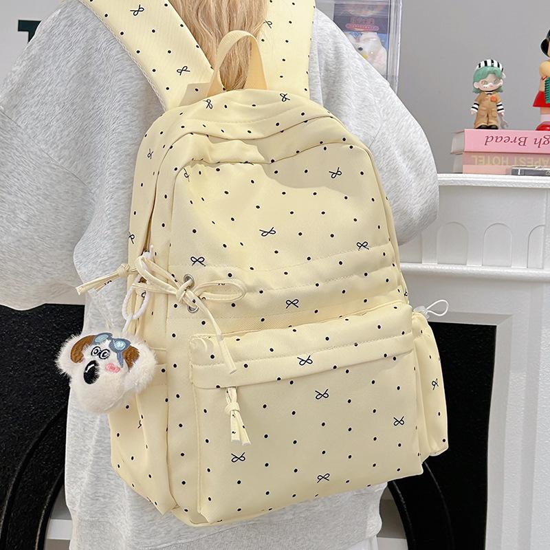 Schoolbag schoolbag junior high school girls girl heart polka dots bow versatile high value primary school backpack women 1011 new