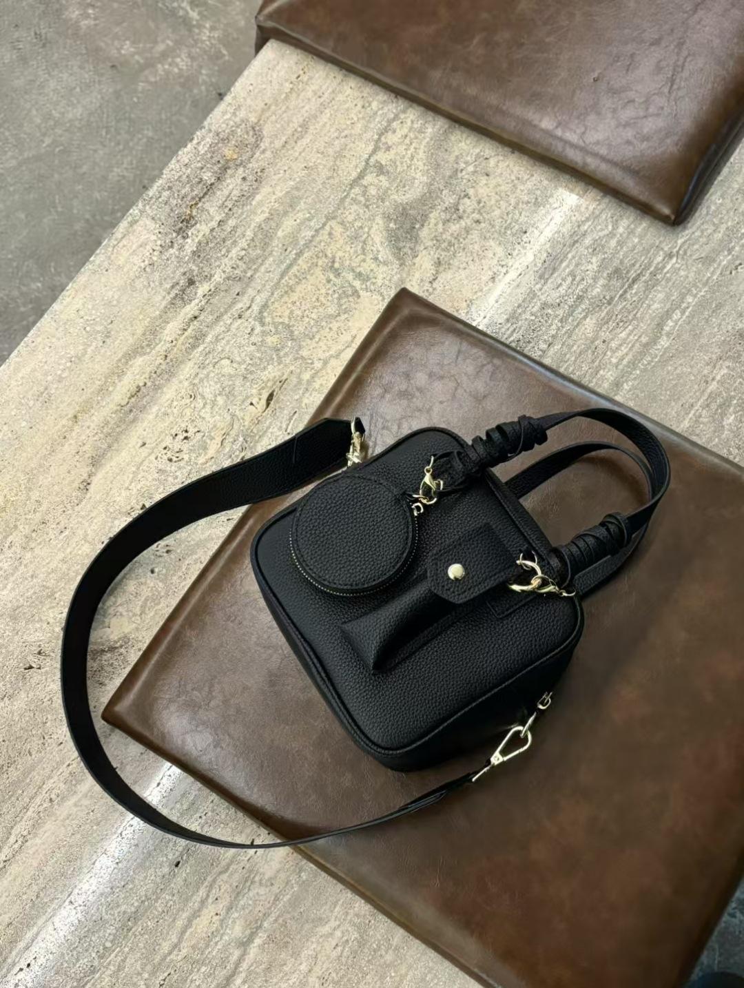 

Сумка для боулинга Niche Design из натуральной кожи с верхним слоем из коровьей кожи 2025 года, новая высококачественная сумка с диагональным поперечным плетением для женщин 16.5x7x14.5cm чёрный