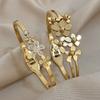 Two-piece set Exquisite, fashionable, and romantic new flower-shaped stainless steel metal bracelet set inlaid with synthetic zirconia, a delicate