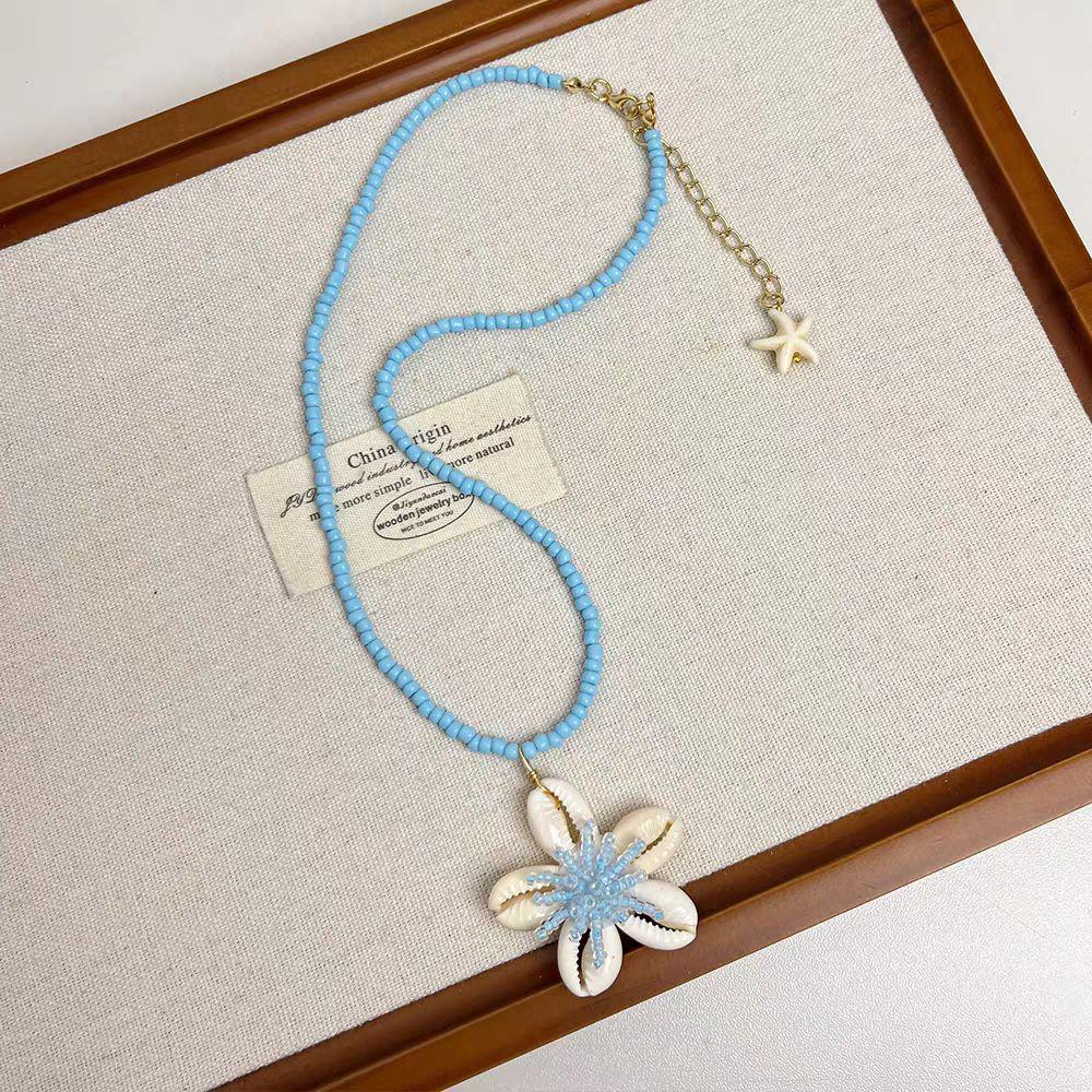 Set Collana e Bracciale Estivo Bohemien con Stella Marina, Conchiglia e Perle