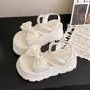 Platform bow sandals female popular summer new Korean version fairy wind pearl one-word buckle with muffin beach sandals