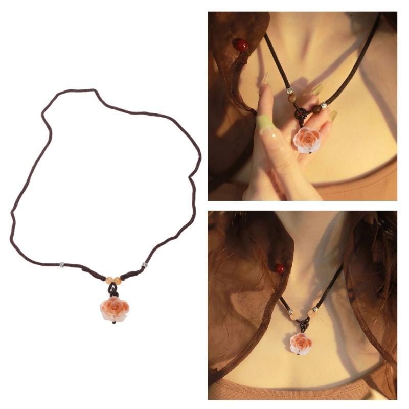 Kwiatowy naszyjnik na obojczyk z wisiorkiem kamelii Stylowy pleciony sznurkowy naszyjnik z kamelią Biżuteria dla kobiet Dziewczyny