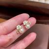 Korean & Japanese Camellia Pearl Stud Earrings: Stylish High-End Women's Fashion for Summer 2024.