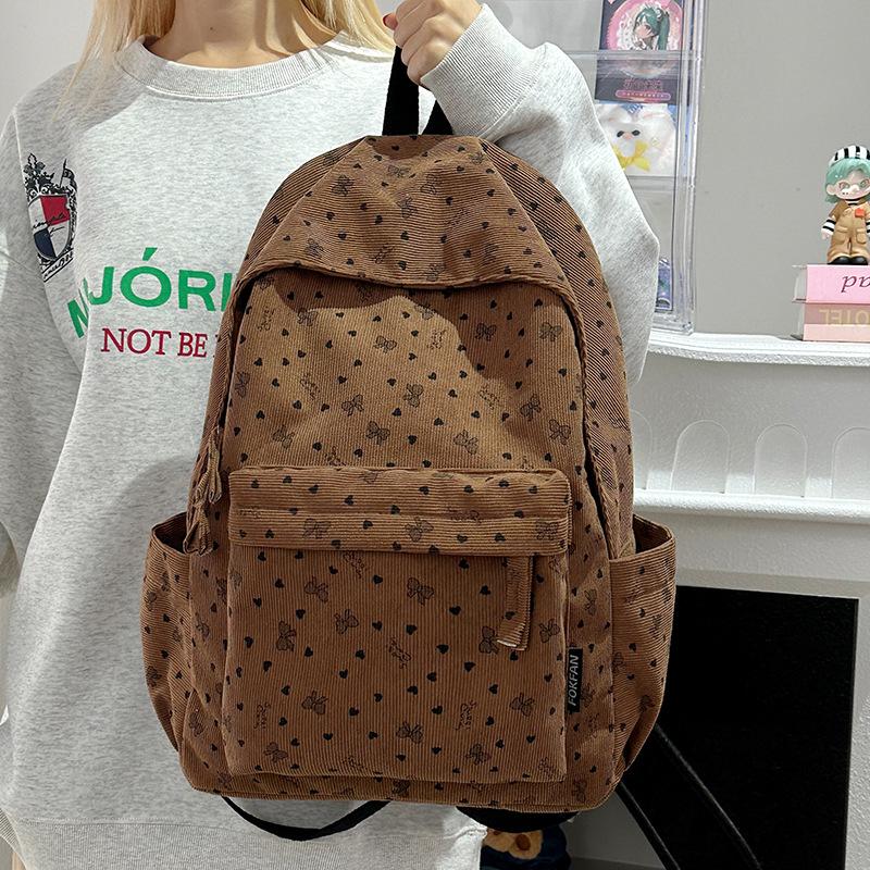 Schoolbag corduroy schoolbag junior high school girls college students autumn and winter backpack women travel lightweight 1011 new niche backpack