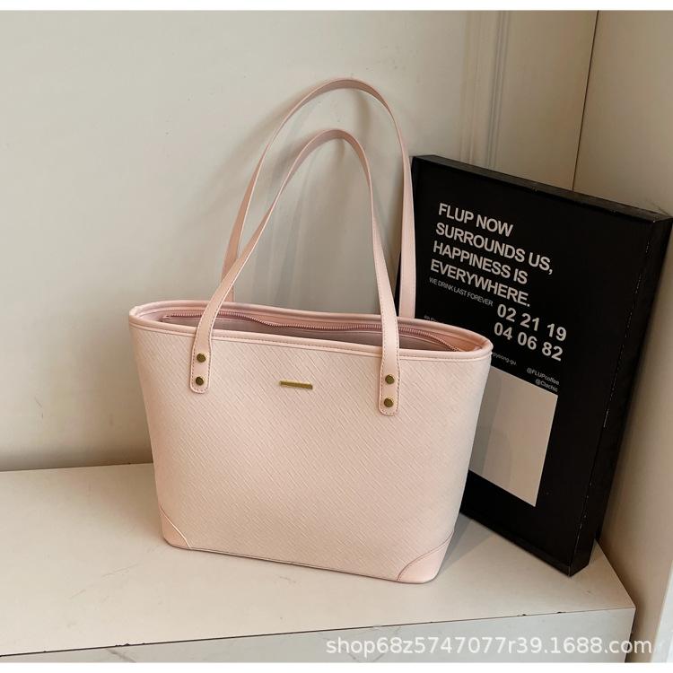 Large-capacity commuter tote bag women's Korean version fashion shoulder bag 2025 new versatile niche simple casual women's bag