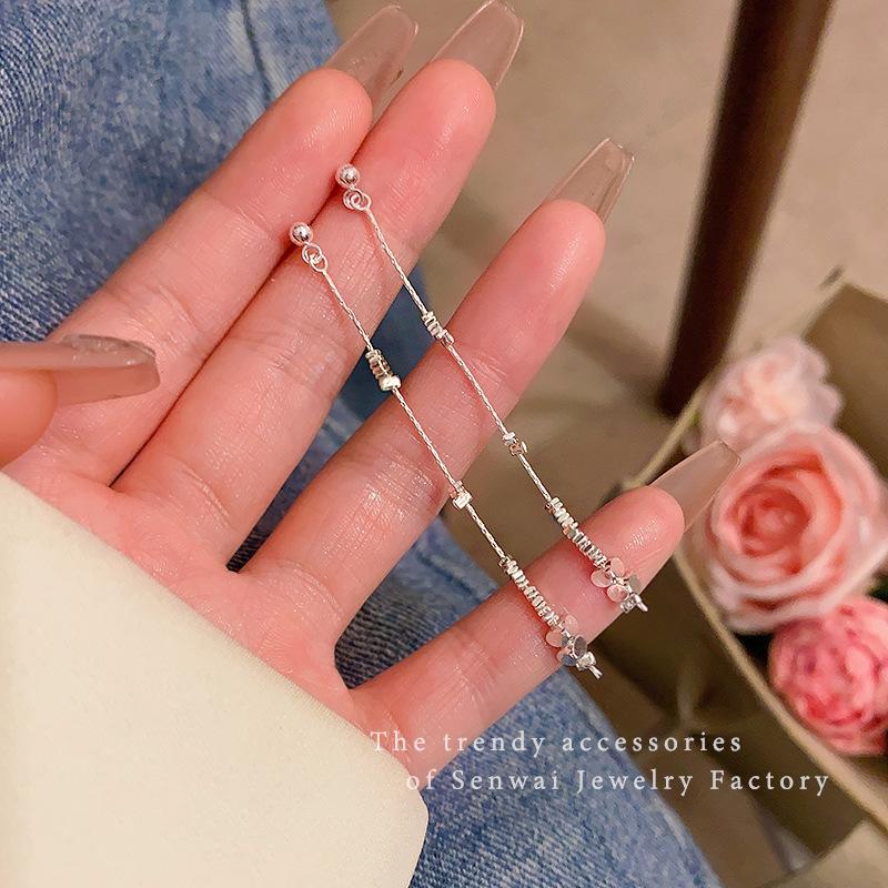 Step by step, broken silver, fringed earrings, women's cold wind temperament, long stud earrings, new Chinese simple earrings.