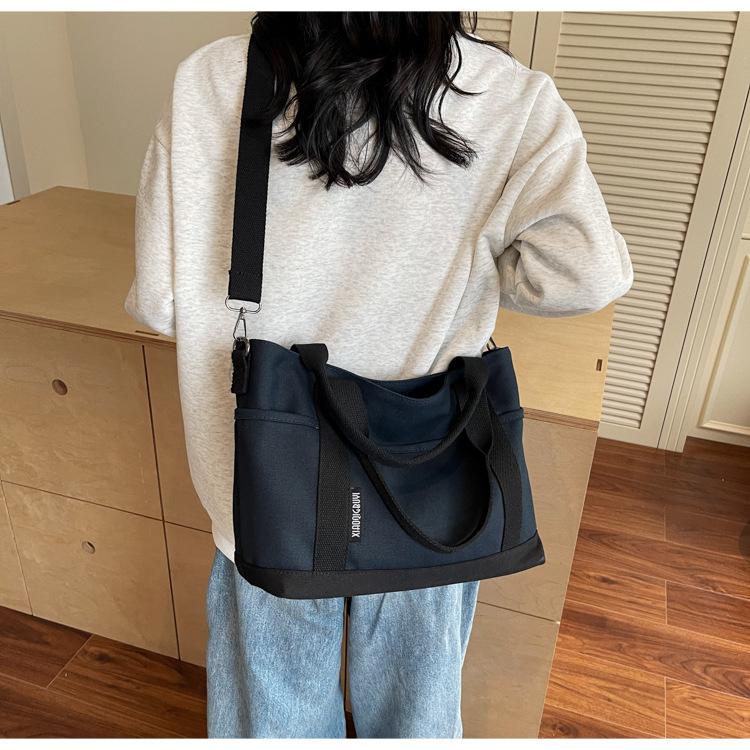 Canvas bag women's large capacity 2025 new summer versatile messenger bag casual portable college student tote bag