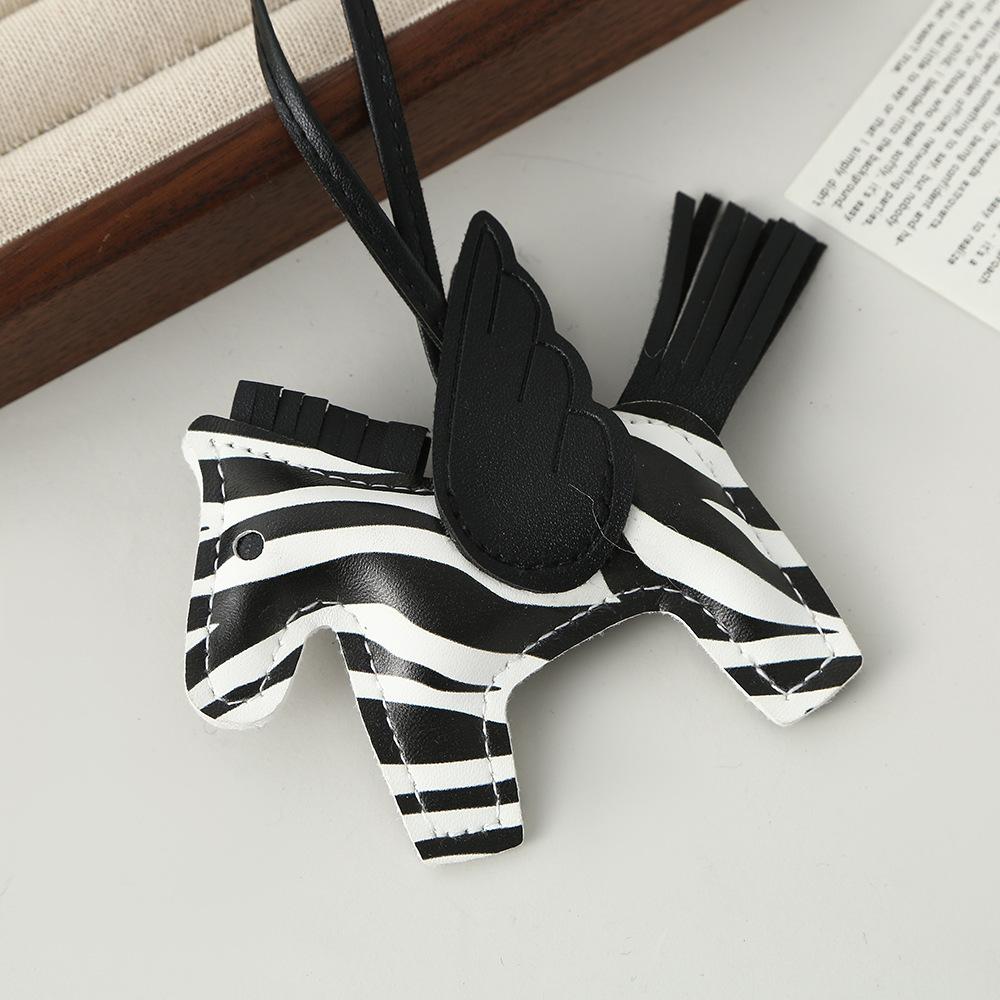 Pony PU-Leder Anhänger grenzüberschreitend original vielseitige Tasche niedlich Trend Auto Schlüsselanhänger Tasche Anhänger Lager