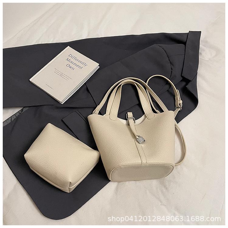

Lychee pattern portable bucket mother bag women s 2025 new simple casual shoulder messenger bag niche vegetable basket bag