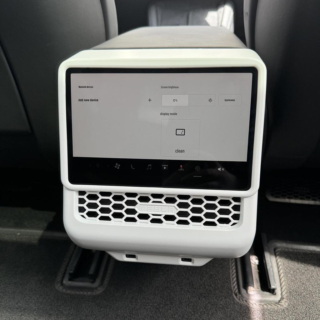 Updated Model 3 Rear Air Vent, Screen Protector, Rear Seat Anti-Kick Guard, and Interior Trim Kit.