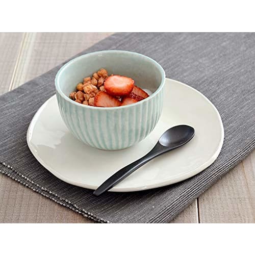 Stylish and smooth to the touch, this oval (black) bamboo spoon is a must-have.