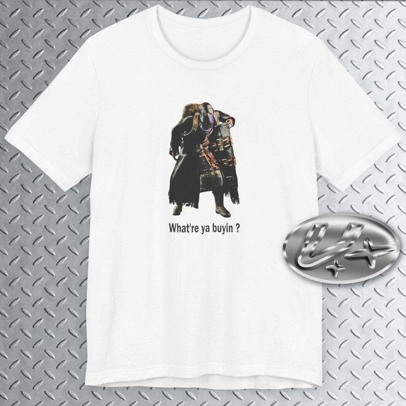 What re ya buyin? ,Re four Merchant Gaming Tee, Funny Videogame reference, 2000s gaming, Y2k videogame 110