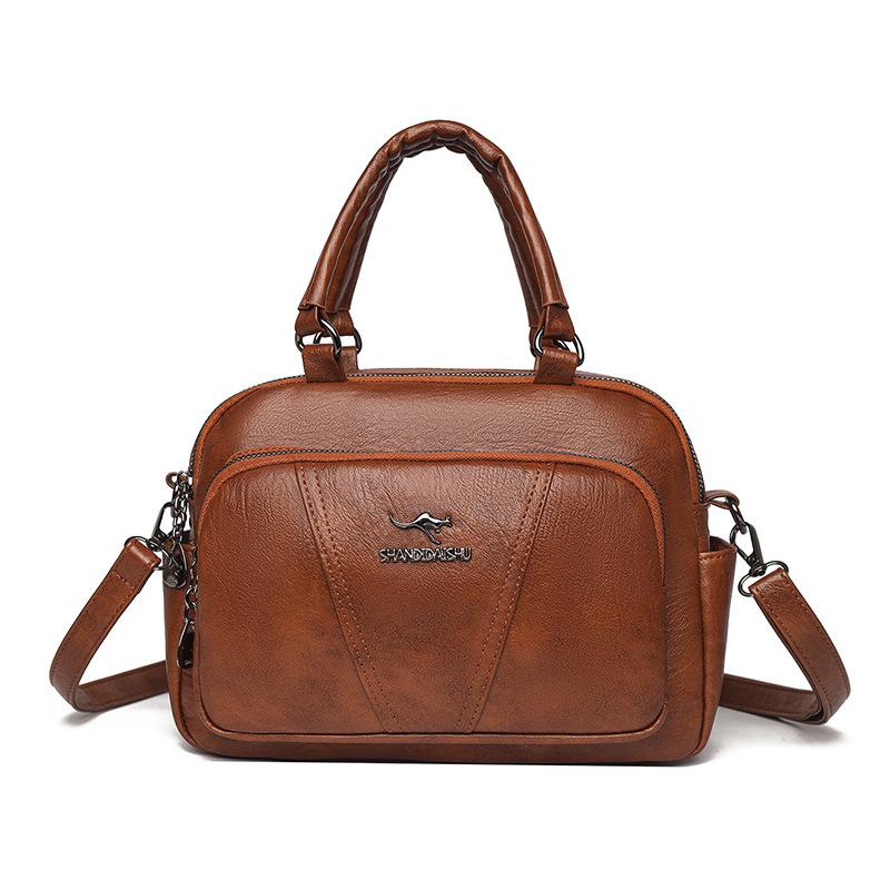 

Fashion retro commuter messenger women s bag new simple casual portable small square bag going out versatile messenger pillow bag светло-коричневого