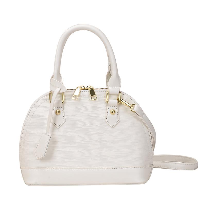 High-value niche design women's bags, fashionable and popular women's shell bags, large-capacity Korean shoulder messenger bags.
