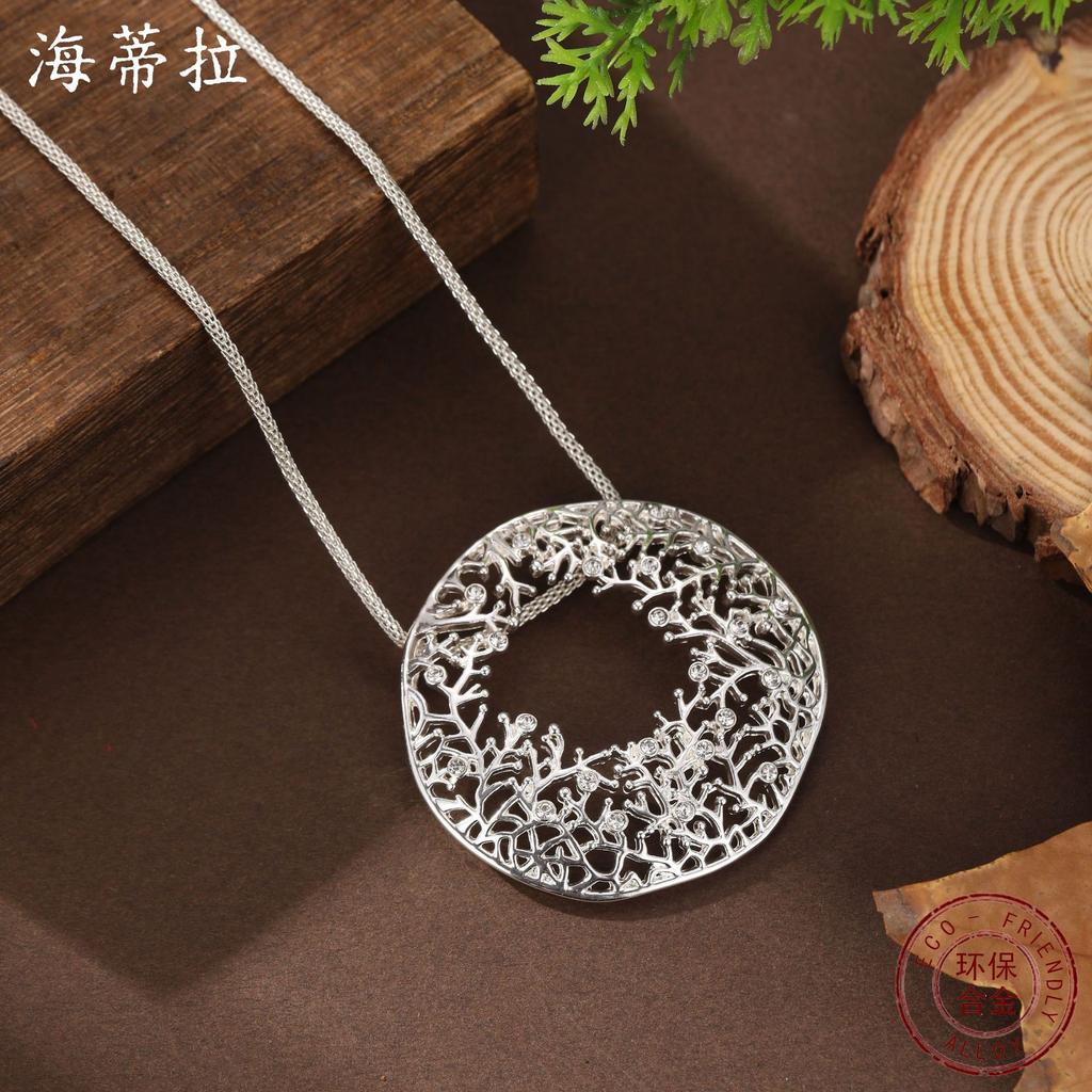 New round hollow irregular coral pendant women's high sense diamond-set geometric coral necklace