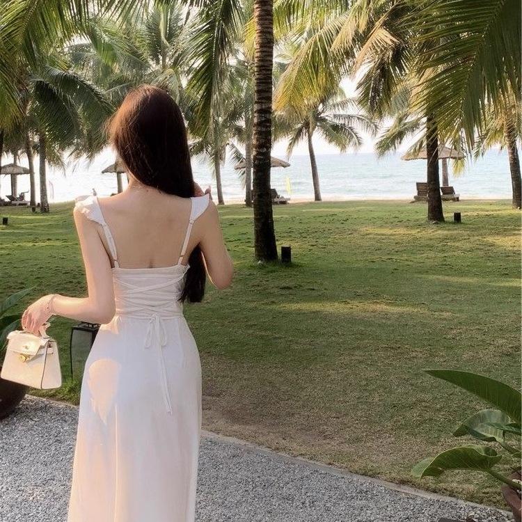 Gentle wind white suspender halter dress children's summer 2026 new seaside film fairy beautiful long dress