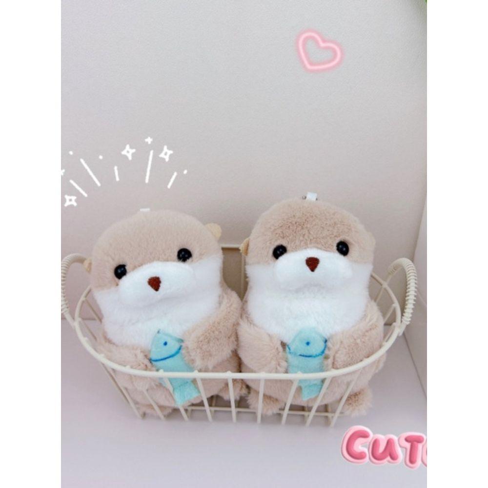 bookaz [bookaz] Otter holding fish keychain