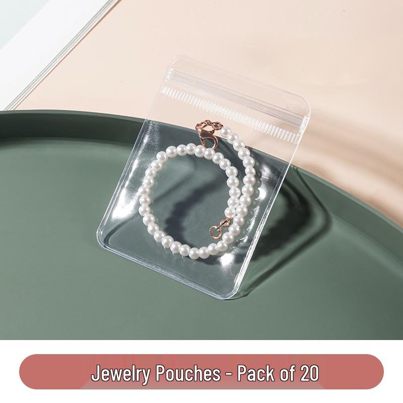 

Transparent Anti-Oxidation Jewelry Storage Box - Dustproof Bag for Earrings, Rings, Bracelets, Necklaces, Sealable Jewelry Album.
