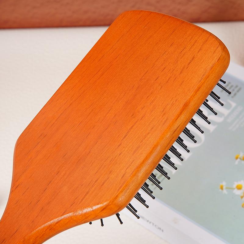 Kam av bokträ med kudde och massagefunktion, med högresilient luftkudde för sektionering och rengöring av hår